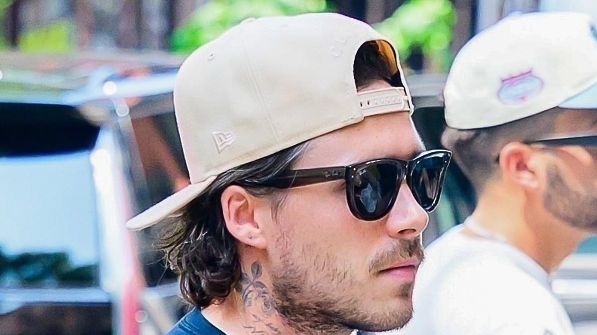 alert-–-brooklyn-beckham-gets-back-to-the-grind:-glum-hot-sauce-salesman-joins-nicola-peltz-shopping-and-heads-for-a-family-lunch-with-the-in-laws