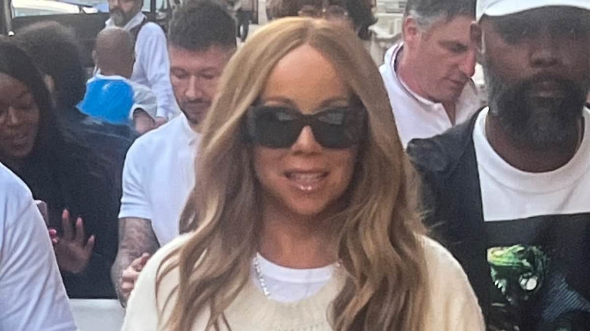 alert-–-mariah-carey-looks-effortlessly-stylish-in-a-2k-dior-sweater-and-shades-as-she’s-mobbed-by-fans-outside-her-london-hotel-ahead-of-brighton-pride-gig