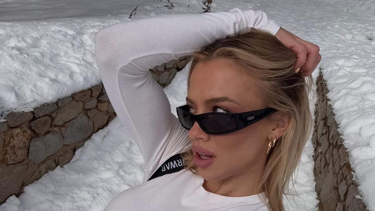 alert-–-tammy-hembrow-suffers-major-wardrobe-malfunction-as-she-goes-braless-under-see-through-snowboarding-ensemble
