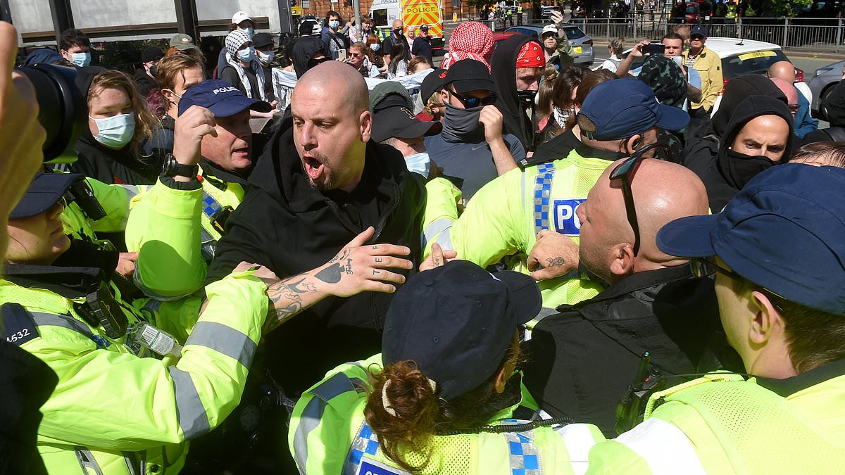 alert-–-police-clash-with-protesters-as-hundreds-of-far-right-supporters-and-counter-demonstrators-confront-each-other