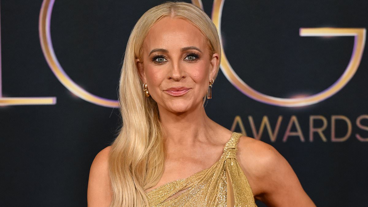 alert-–-logie-awards-2025:-carrie-bickmore-turns-heads-in-a-shimmering-gold-gown-as-she-graces-the-red-carpet