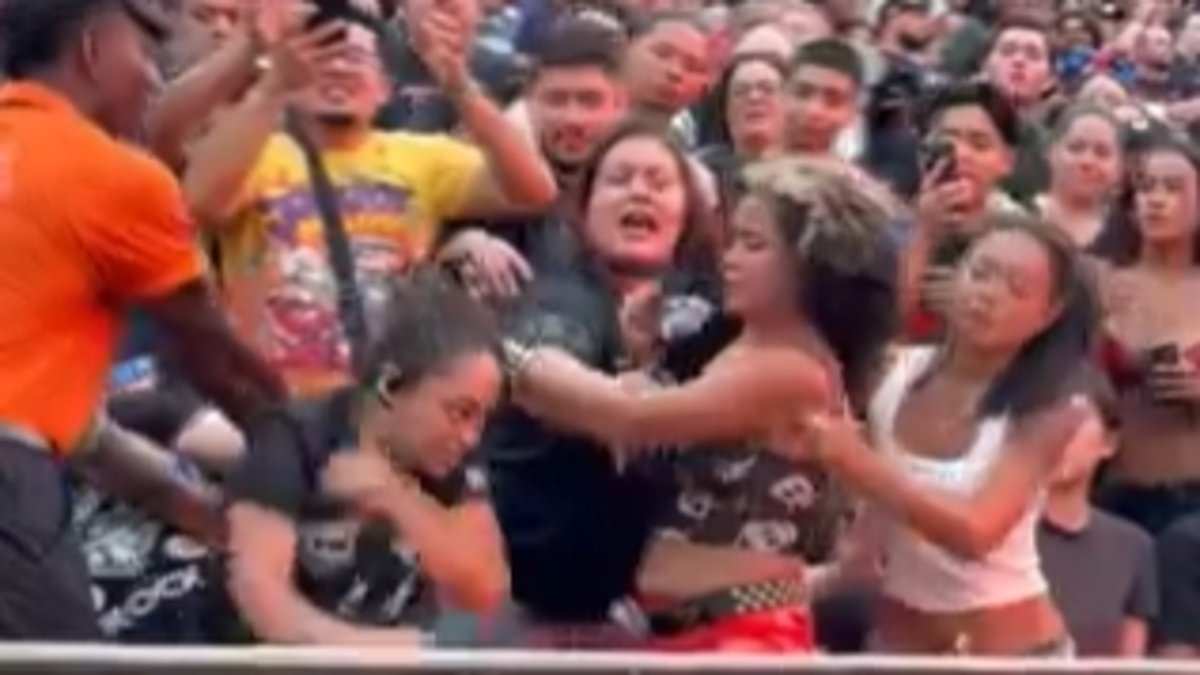 alert-–-vicious-brawl-between-female-wwe-fans-breaks-out-as-summerslam-chaos-hits-the-stands-in-new-jersey