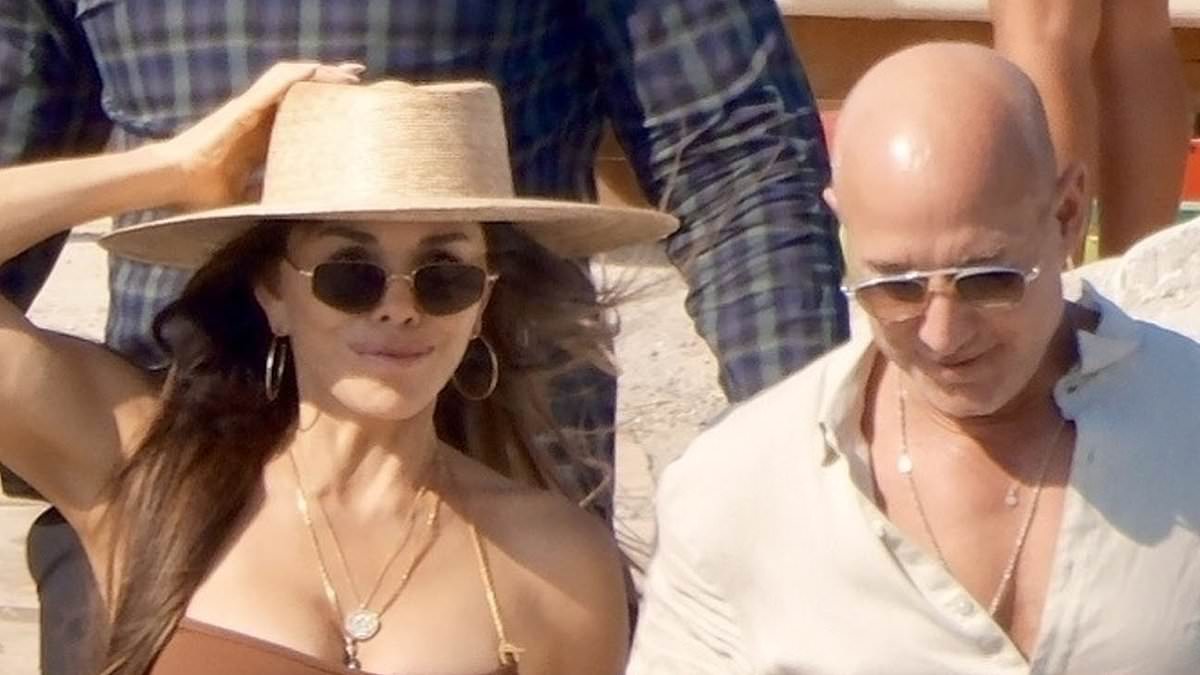 alert-–-lauren-sanchez-ditches-the-heels-after-struggling-to-stay-on-her-stiletto-clad-feet-during-treacherous-walk-across-a-pebble-beach-–-as-she-joins-husband-jeff-bezos,-leonardo-dicaprio-and-vittoria-ceretti-for-another-double-date-in-ibiza