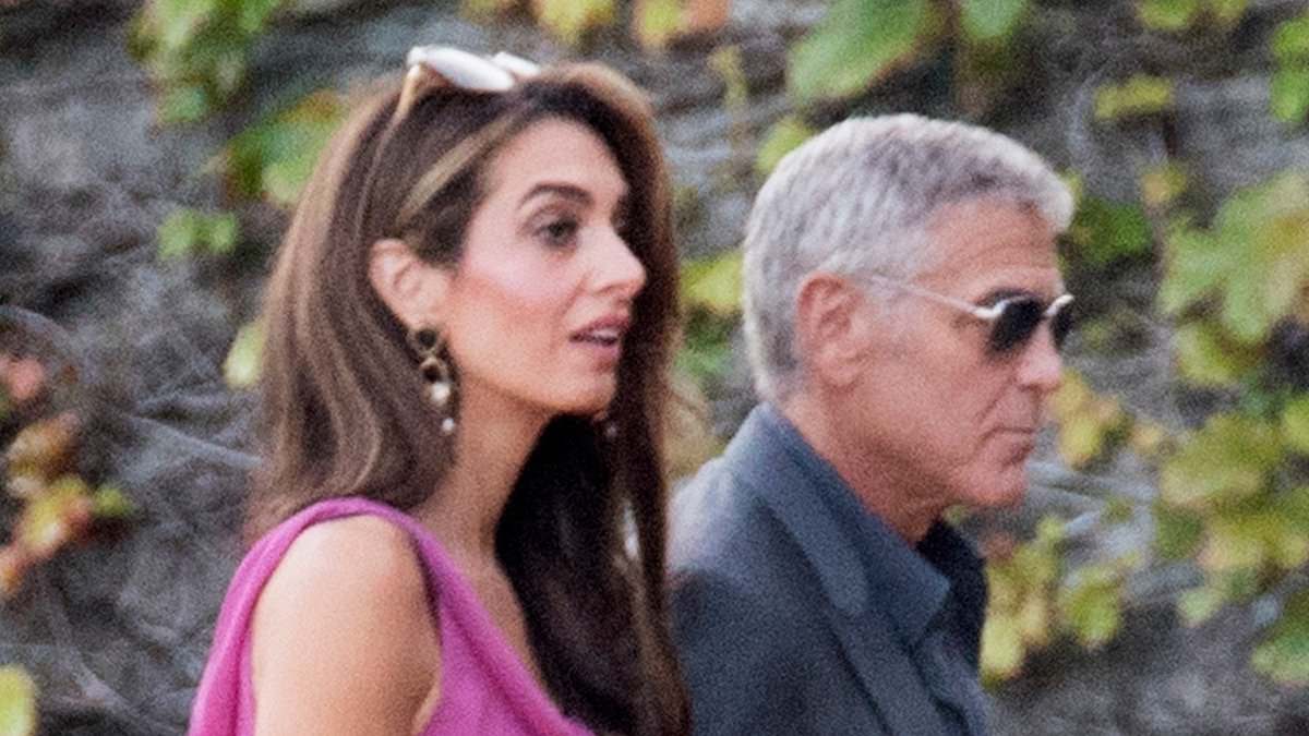 alert-–-amal-clooney,-47,-cuts-an-elegant-figure-in-a-pink-thigh-split-dress-as-she-and-her-dapper-husband-george,-64,-head-out-for-dinner-in-lake-como