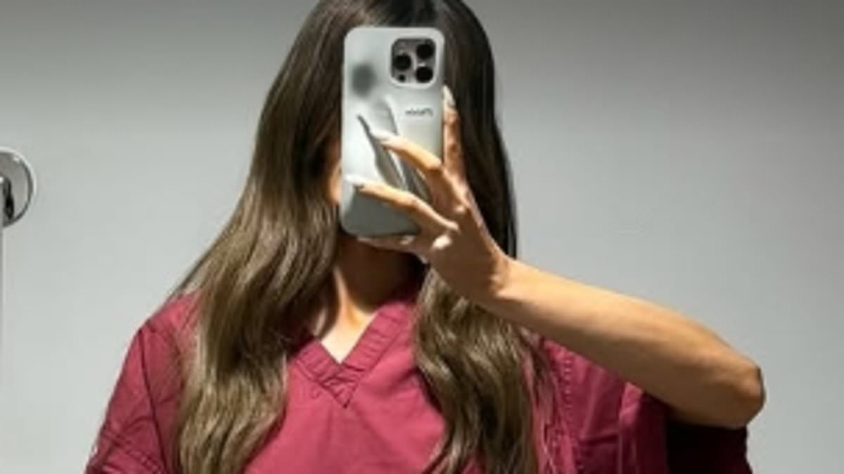alert-–-maura-higgins,-34,-poses-for-a-mirror-selfie-in-a-red-hospital-gown-before-an-mri-as-her-mystery-injury-is-revealed