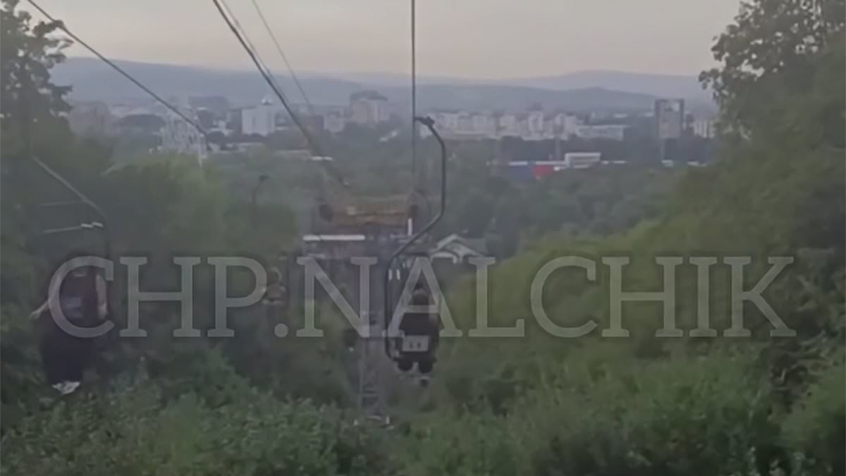 alert-–-horrific-moment-chairlift-collapses-in-a-russian-resort,-with-four-people-plunging-into-a-lake,-and-six-hitting-the-ground-–-as-others-are-trapped-dangling-mid-air