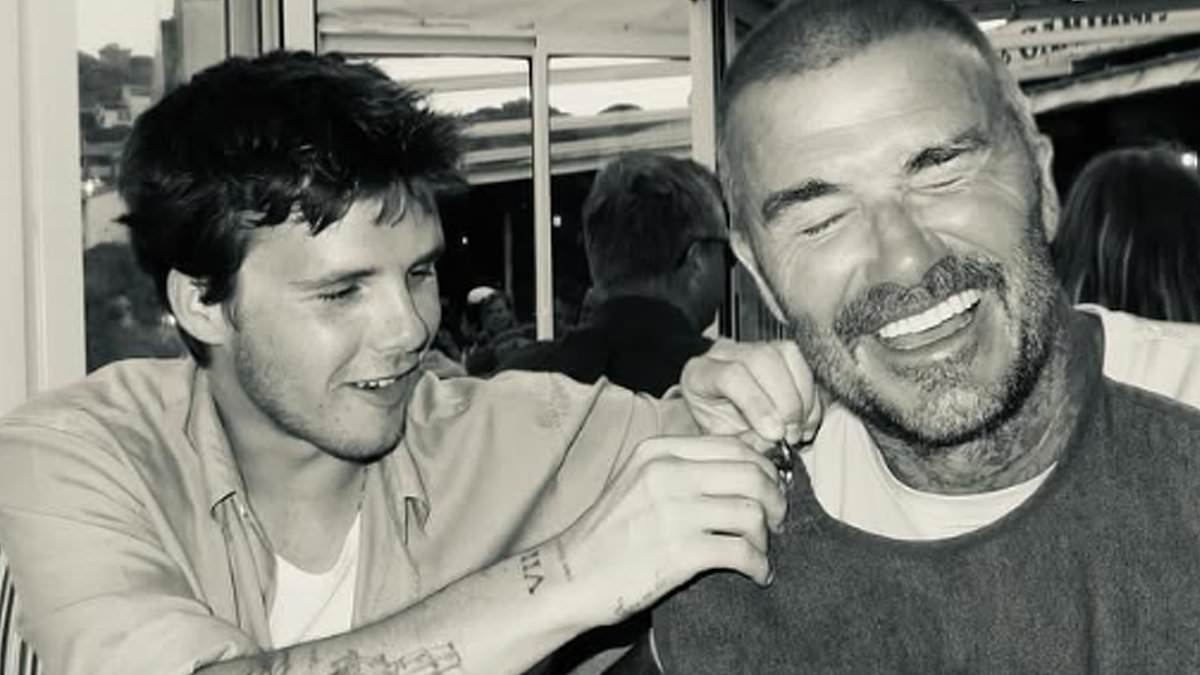 alert-–-david-beckham-larks-around-with-son-cruz-in-swanky-st-tropez-restaurant-in-fun-filled-snap…-hours-after-extending-olive-branch-to-eldest-brooklyn-amid-‘feud’