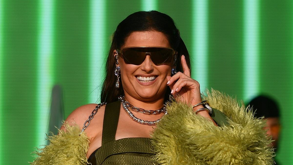 alert-–-nelly-furtado,-47,-rocks-ruffled-hotpants-and-quirky-boots-at-boardmasters-festival-in-cornwall