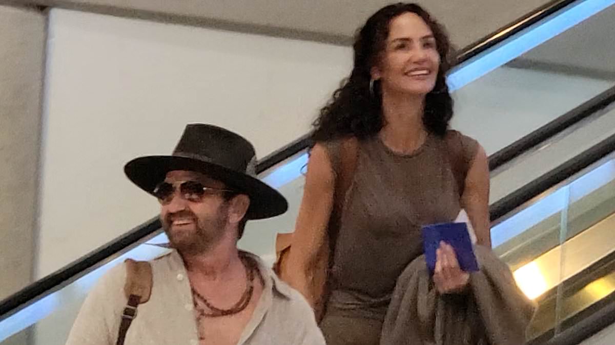 alert-–-gerard-butler-and-longtime-girlfriend-morgan-brown-look-every-bit-the-loved-up-couple-as-they-jet-out-of-lax