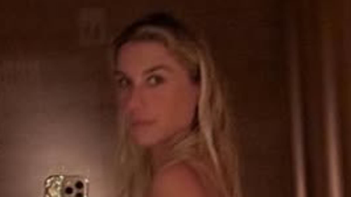 alert-–-kesha-sets-pulses-racing-as-she-strips-off-and-flashes-her-cleavage-in-raunchy-bathroom-snaps