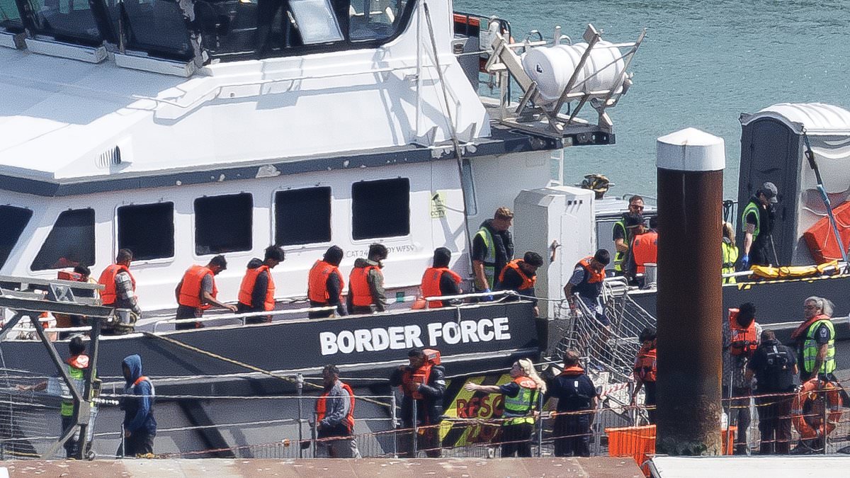 alert-–-woman,-49,-is-arrested-amid-probe-into-the-supply-of-small-boats-to-people-smugglers