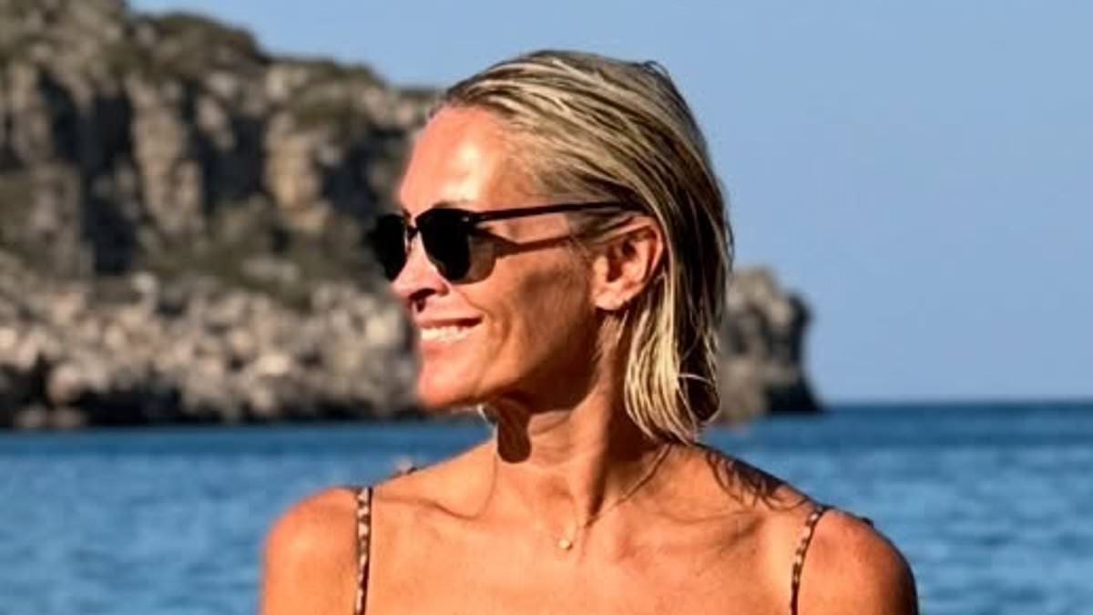 alert-–-jenni-falconer,-49,-displays-her-flawless-physique-in-a-skimpy-leopard-print-bikini-as-she-soaks-up-the-sun-during-summer-break-in-greece