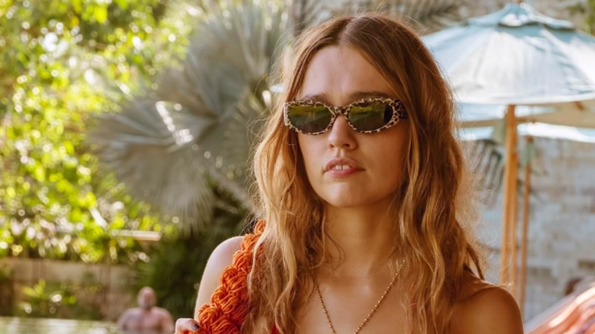 alert-–-aimee-lou-wood-reveals-her-keepsake-from-the-white-lotus-as-she-models-the-same-red-ruffled-bikini-worn-by-chelsea-on-hit-show-–-after-putting-walter-goggins-feud-rumours-to-bed