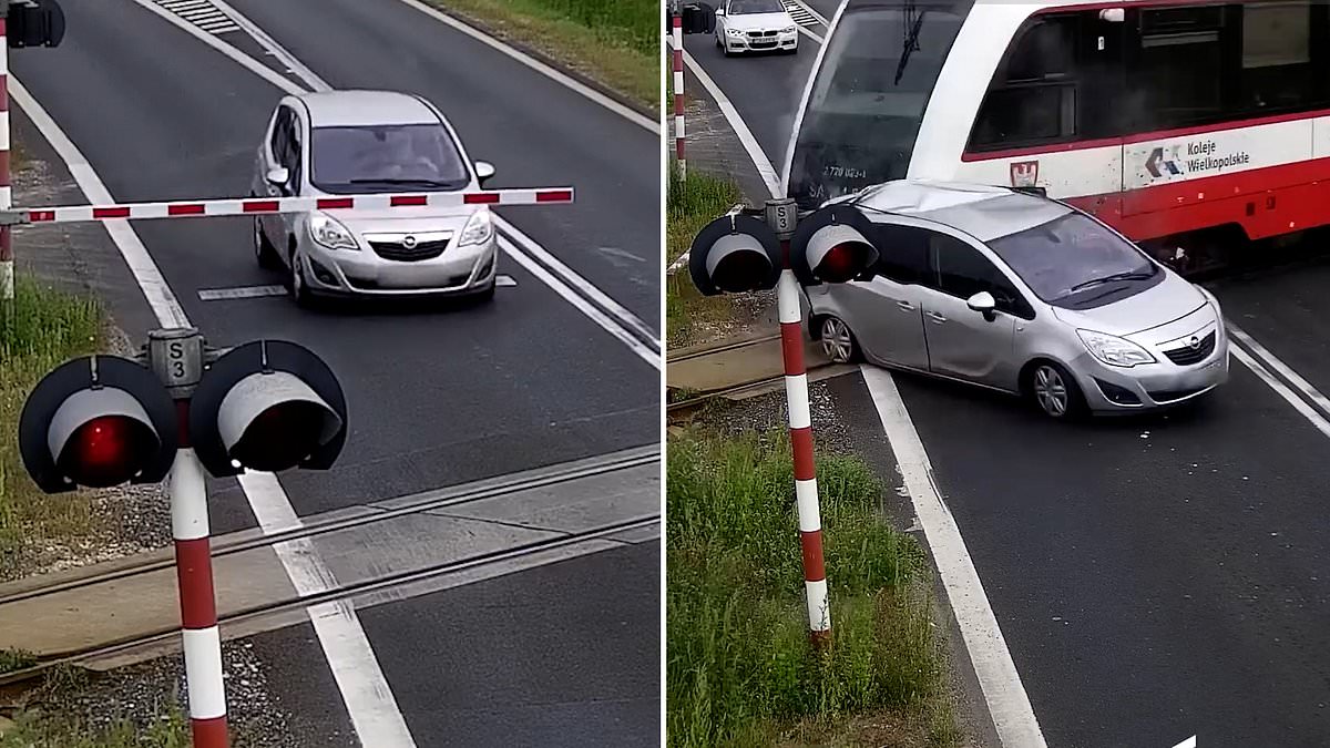alert-–-moment-train-ploughs-into-car-after-driver-smashes-through-barrier-at-level-crossing-and-stops-on-tracks