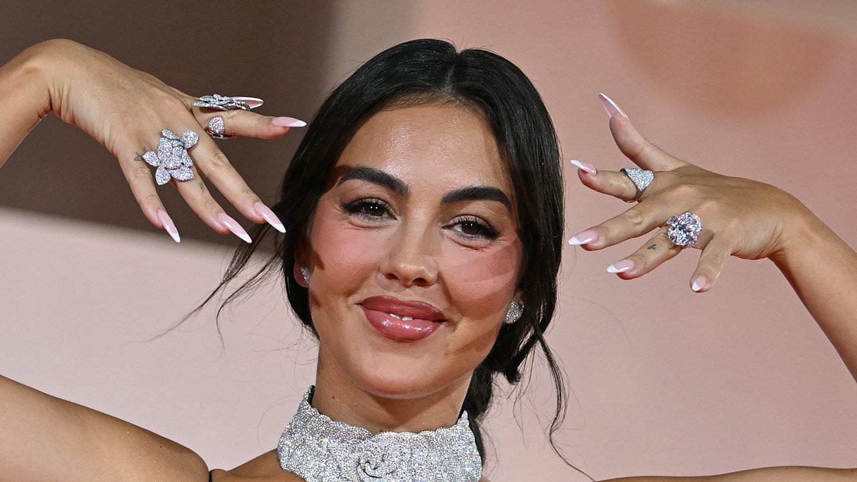 alert-–-ronaldo’s-fiancee-georgina-rodriguez-flashes-her-giant-$3million-engagement-ring-as-she-sizzles-in-a-lace-dress-at-the-filming-italy-venice-award-amid-the-82nd-film-festival