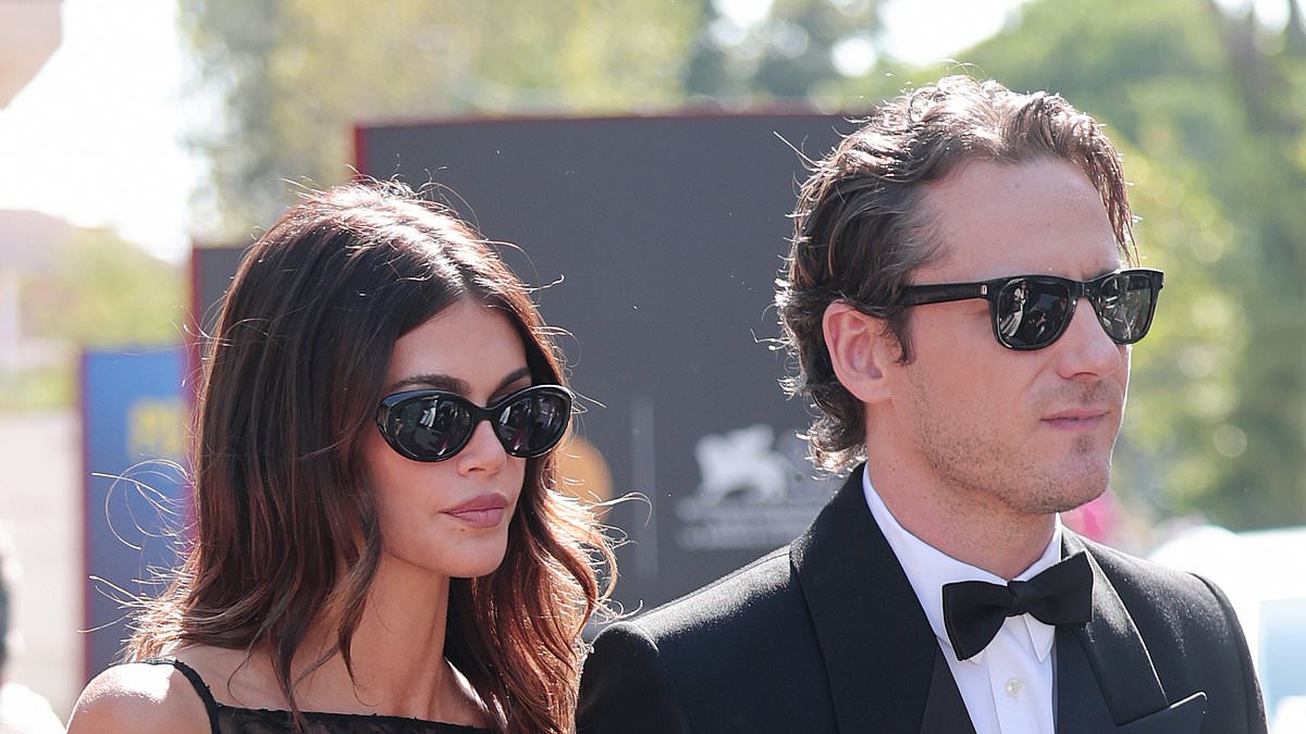 alert-–-braless-kaia-gerber,-23,-packs-on-the-pda-with-her-boyfriend-lewis-pullman,-32,-as-she-slips-into-a-sheer-black-lace-dress-for-loved-up-appearance-at-the-venice-film-festival